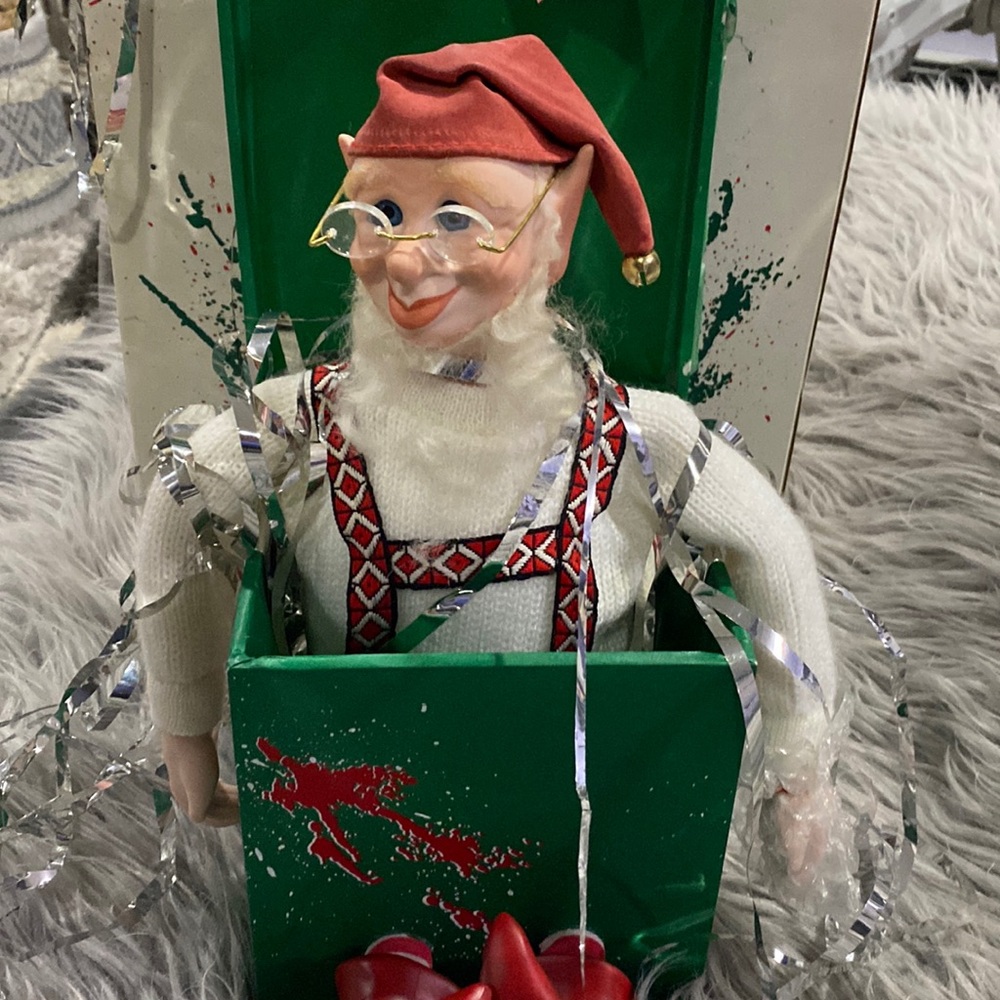 Elf in a present Musical Box